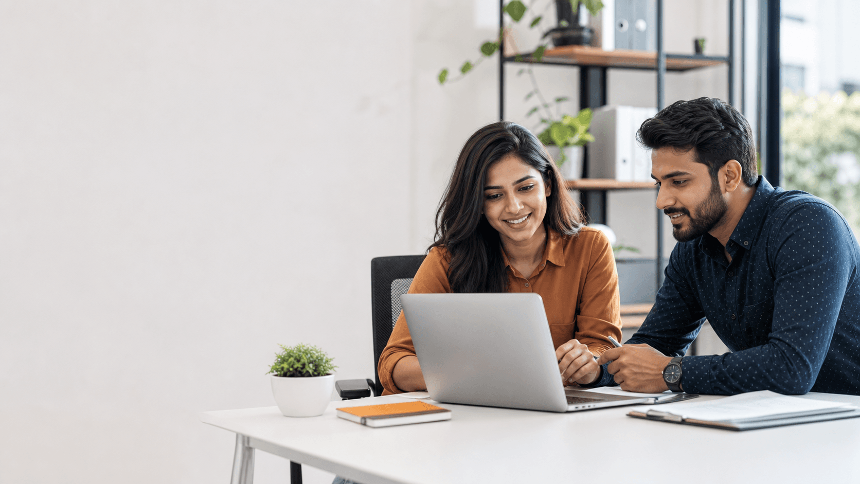 Two professionals reviewing an opportunity together
